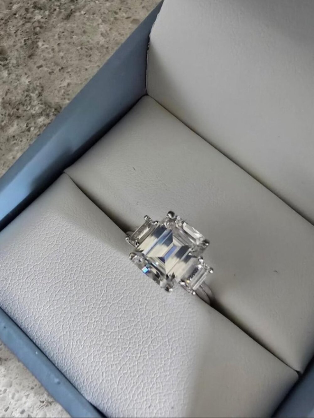 Beautiful emerald cut more than night ring with sidestones